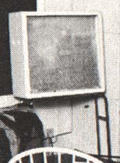 Early white-covered (or stripped) Marshall 4×12 straight-front cabinet on a stand in Pete’s home studio.