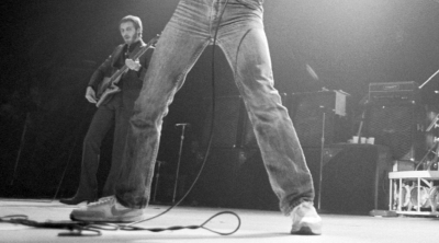 10 or 11 Sept. 1982, N.E.C., Birmingham, three Mesa-Boogie 4×12 cabs (top) in place of the Sunn 412L 4×12 cabs, with four Mega 1×18 cabs (bottom). Roger’s CP103 and Mesa-Boogie 4×12 visible at right.