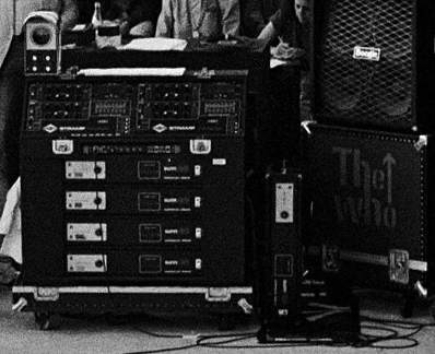 Ca. 1982, custom amp rack, with four Stramp 4120 stereo preamps, Alembic input module/splitter, and four Sunn Coliseum Slave power amps.