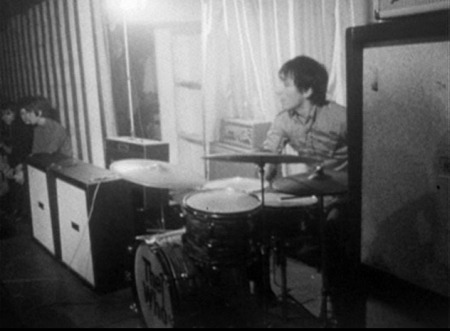 16 Feb. 1965, at the Marquee, view of John’s two Marshall 4×12 cabinets side-by-side, powered by Marshall JTM45 50-watt amp.