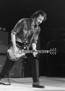 Ca. 1979, with cherry sunburst no. 8, with prototype-era black surround of the middle-position pickup.