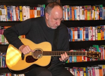 Ca. 2006, performing with the recent Collings OM-3 fitted with Fishman Ellipse Matrix Blend pickup system.