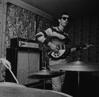 Click to view larger version. Ca. 1964, at the Railway Hotel, Fender Pro head on top of early Marshall 4×12. Guitar is Rose Morris, Co. LTD., Rickenacker 1998 fitted with trapeze tailpiece from Gibson EDS-175.