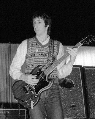 Ca. August 1968 at the Fillmore West, San Francisco. One of the earliest uses of the Gibson SG Special. Amps are three Sound City L100 into four Sound City 4×12 cabinets. Effects pedal is Dallas-Arbiter Fuzz Face.