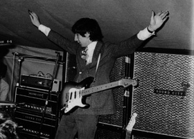 Ca. 1967, multiple shots of two customised Sound City L100 amplifiers, each with different blockscript Sound City nameplate badge; topped by a Grampian Reverb unit. Speakers cabinets are four Sound City 200w 4×12 cabinets, evidently held together with gaffer’s tape. -3