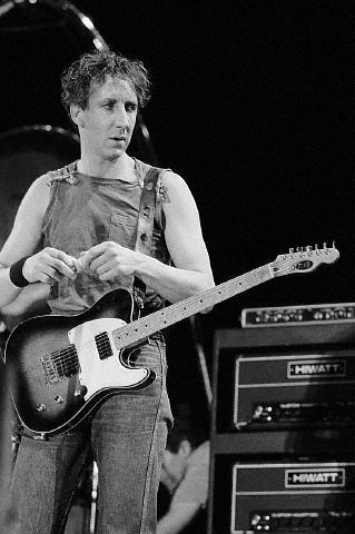 Ca. 1982, with two CP103 amps topped by Roland SDE-2000 DDL digital delay. Guitar is double-bound sunburst Giffin Telecaster. Courtesy Mark Herman.